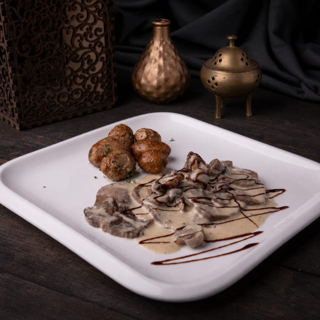 Beef Tongue in Mushroom Sauce.